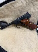 Colt woodsman .22/  Browning Bda .380