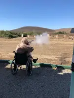 Ken shooting black powder.webp
