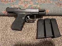 Glock 19 Gen 3 + Talon Grips + Ameriglo Sights + Guide Rod + Slide Stop Release