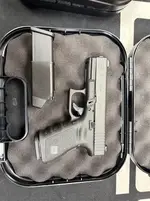 Glock 19 with ramjet and oem barrel