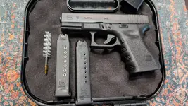 Glock19_left side_2 Mags.webp