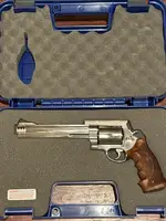 Smith & Wesson 460XVR  8.38in Revolver  w custom Karl Nill grips and top rail , 100 Rd Hornady FTX, reloading stuff