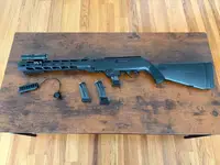 Brand new Ruger PCC MLOK (no box) with Olight Odin Mini Light