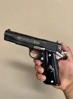 Colt 38 super oscuro y plata