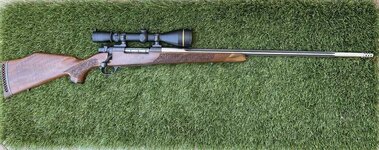 Custom .300 Weatherby Lazermark w/Leupold VX III 4.5-14x50mm scope with lens covers